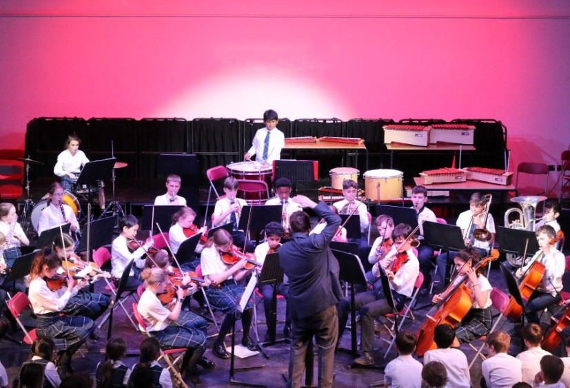 Heath Mount's Symphony Orchestra perform Tchaikovsky in the school's performing arts centre with Director of Music Robert Fisher conducting